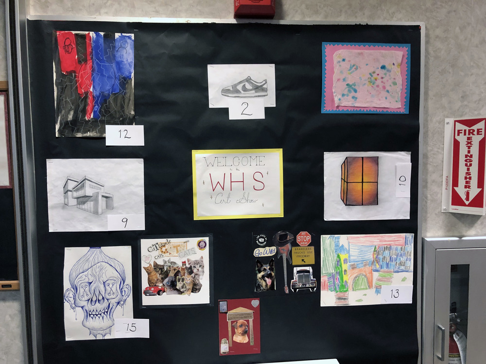 Welcome to the WHS Art Show sign with 2-D artwork around it